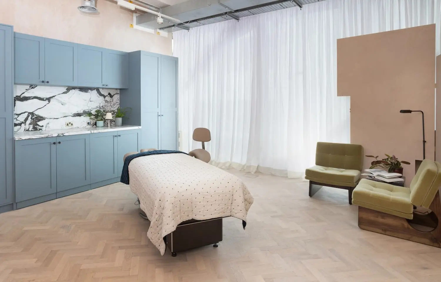 A calm, light-filled spa treatment room